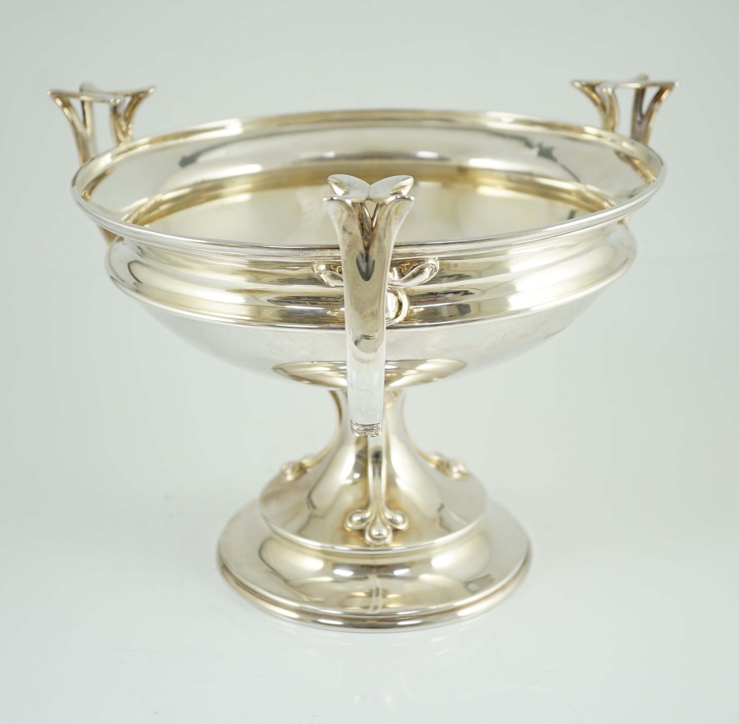 An Edwardian Art Nouveau silver tri-handled pedestal fruit bowl, by Joseph Rodgers & Sons